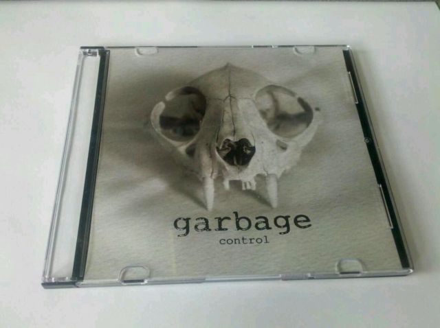 http://www.garbage-discography.co.uk/wp-content/uploads/2012/08/T2eC16VHJHoE9n3Ke4-kBQNi3t7-OQ60_58.jpg